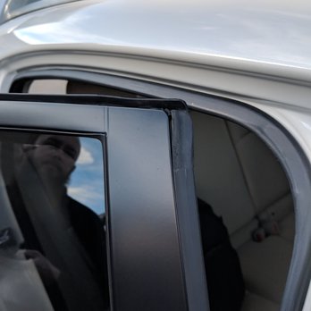 Caliber Collision - Weather strip on door corner was installed twisted/bent. This picture was taken after it was snapped back into place (a bit stretched). - Body Shops Near Me - Seaside, California