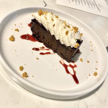 Pearl & Vine - chocolate torte, vanilla whip, peanut brittle - New American Near Me - Katy, Texas Pearl & Vine - chocolate torte, vanilla whip, peanut brittle - New American Near Me - Katy, Texas