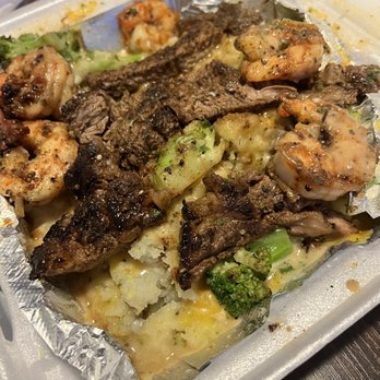 OMG Baked Potatoes - Steak and Shrimp Potato - Soul Food Near Me - Houston, Texas OMG Baked Potatoes - Steak and Shrimp Potato - Soul Food Near Me - Houston, Texas