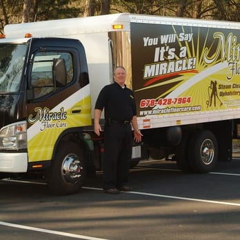 Miracle Floor Care - a man standing in front of a truck - Flooring Near Me Miracle Floor Care - a man standing in front of a truck - Flooring Near Me