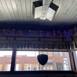 Klopp's 5th Avenue Bar - Tappers all along ceiling