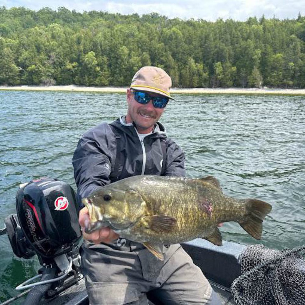 Silver Strike Fishing - Captain Sid with a 6lb+ smallmouth bass!! - Fishing Near Me - Baileys Harbor, Wisconsin Silver Strike Fishing - Captain Sid with a 6lb+ smallmouth bass!! - Fishing Near Me - Baileys Harbor, Wisconsin