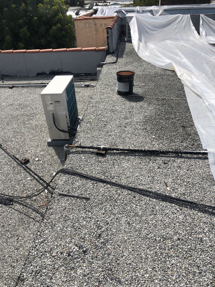 Slide of Huncho Roofer