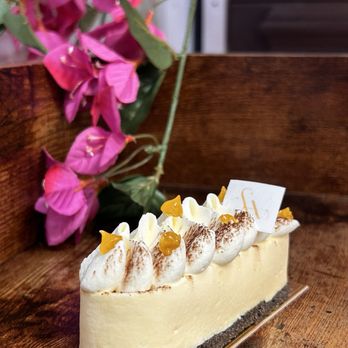St Honore bakery - a luxurious Passion Fruit Delight with Ivorian Dark Chocolate. - Patisserie/Cake Shop Near Me - Wake Forest, North Carolina St Honore bakery - a luxurious Passion Fruit Delight with Ivorian Dark Chocolate. - Patisserie/Cake Shop Near Me - Wake Forest, North Carolina