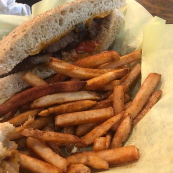 Lengthwise: The Pub - Tri-tip sandwich (well, half of it. I'd already eaten the other half!) and seasoned fries!! Soooo good! - American Near Me - Bakersfield, California