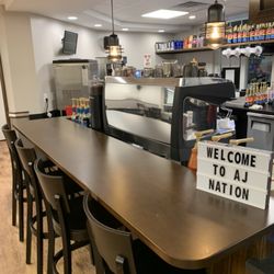 Aroma Joe's - Take a seat at our espresso bar and watch our baristas mix up some of our many "Esspresin" beverages.