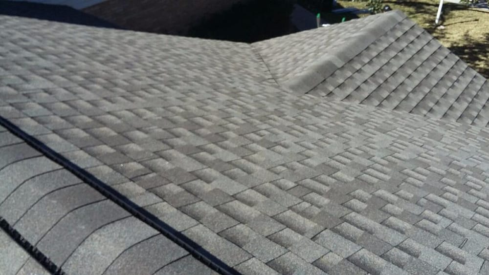 Slide of Tim's Roofing