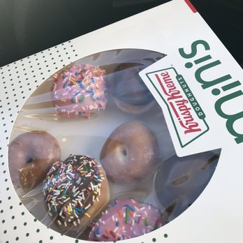 Krispy Kreme - Mini donuts, y'all. Precious. And tasty! They only come in the types seen here: original, choc, choc sprinkles, and strawberry sprinkles - Donuts Near Me - High Point, North Carolina