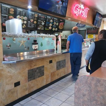 The Grill - They are all decked out for Christmas! Looks like this at every top of every booth - Burgers Near Me - Fullerton, California The Grill - They are all decked out for Christmas! Looks like this at every top of every booth - Burgers Near Me - Fullerton, California