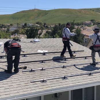 EA Design and Build - The EA crew setting up to install panels on the roof - General Contractors Near Me - Irvine, California