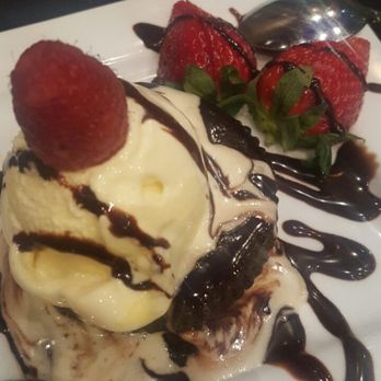 Bundoo Khan -Chicago - Amazing desert, warm chocolate amazingness..served with vanilla ice cream fresh strawberries and chocolate drizzle. - Indian Near Me - Chicago, Illinois