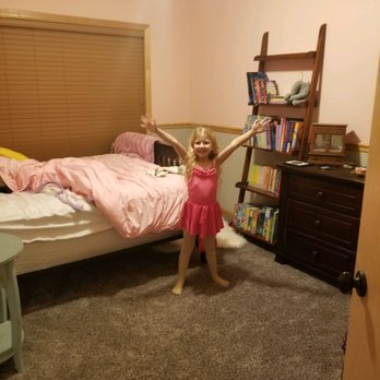 Sage Flooring - a young girl in a bedroom - Flooring Near Me - Waconia, Minnesota