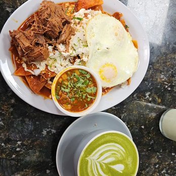 Tata's Cafe - Chilaquiles Rojos with over medium eggs and a matcha latte - Breakfast & Brunch Near Me - Hawthorne, California Tata's Cafe - Chilaquiles Rojos with over medium eggs and a matcha latte - Breakfast & Brunch Near Me - Hawthorne, California
