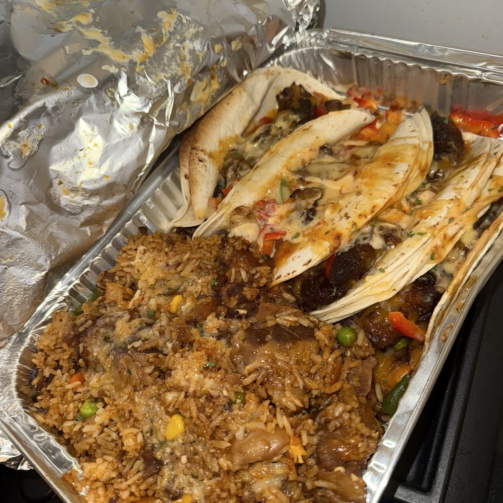 Dacks Cuisine - Oxtail Taco with oxtail fried rice - Caribbean Near Me - Bronx, New York
