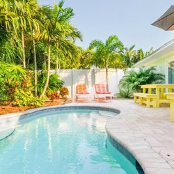 Lizzie Lus Island Retreat - Want a vacation rental with a pool? Many of ours have tropical garden backyards and other amenities that are sure to Wow you,...