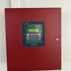 FireWatch - The bright red alarm box placed in the center of our building's main lobby.