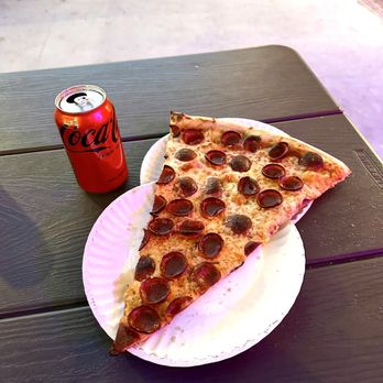 Alpha Pie - A pizza slice bigger than your head, and the crust is (chef's kiss). - Pizza Near Me - Chapel Hill, North Carolina Alpha Pie - A pizza slice bigger than your head, and the crust is (chef's kiss). - Pizza Near Me - Chapel Hill, North Carolina