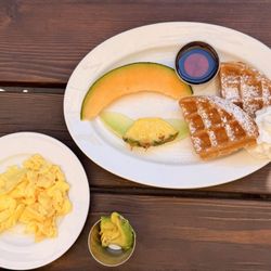 Kids waffle and scrambled eggs with avocado