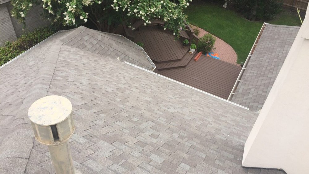 Slide of NSL Roofing Solutions