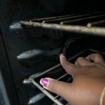 Atlanta Green Maids - Me removing oven grease with my nail after they cleaned my oven - Home Cleaning Near Me - Atlanta, Georgia