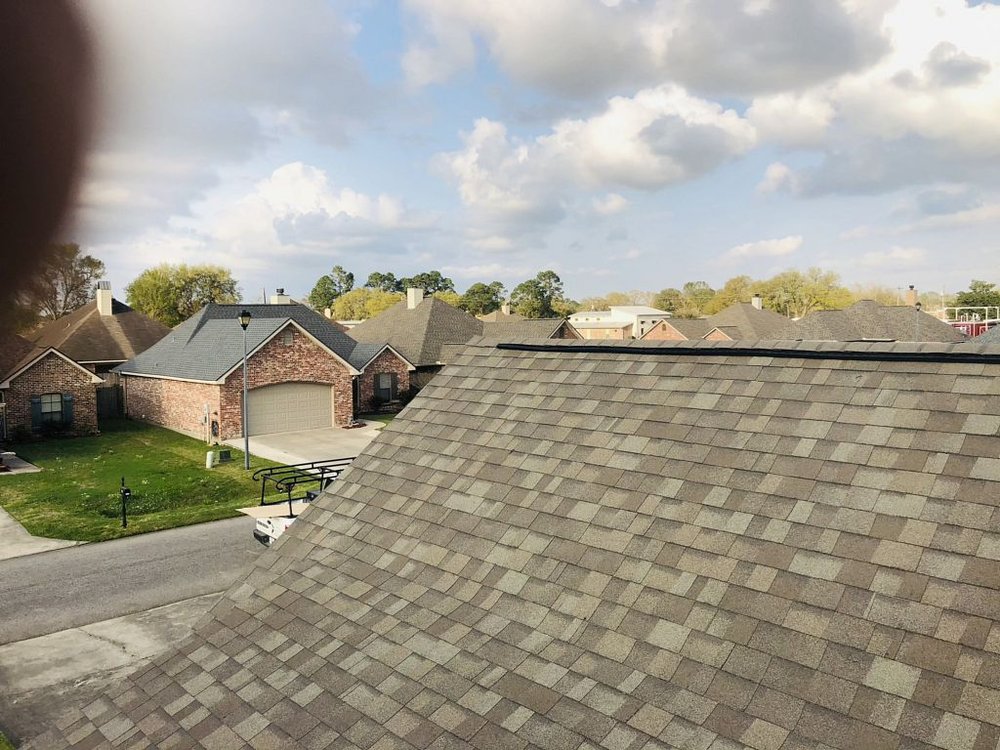 Slide of Pelican Roofing Company