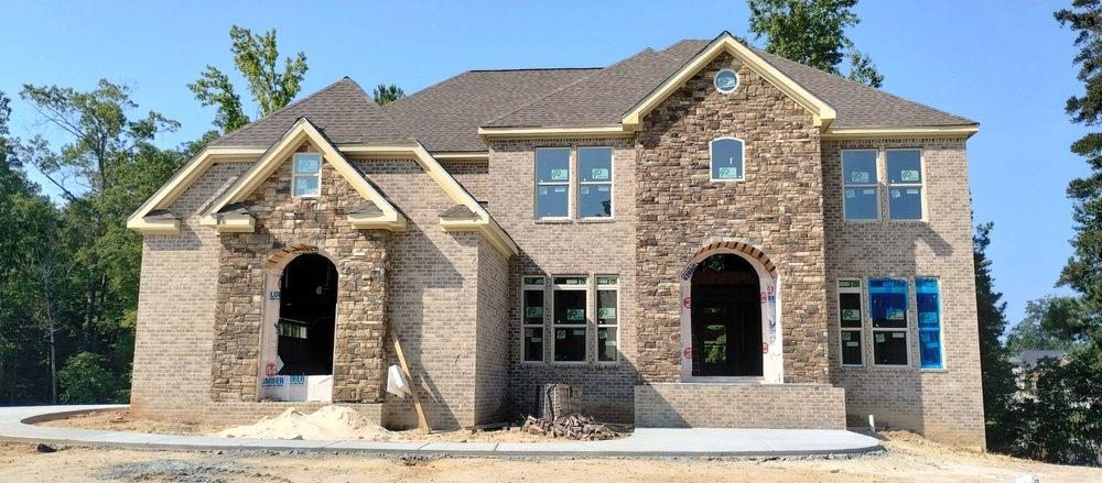 Slide of Godfrey Tree Removal & Roofing