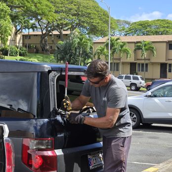 Aloha Mobile Auto Glass - Ashton taking out the broken window - Auto Glass Services Near Me - Honolulu, Hawaii