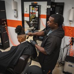 Fresh Unisex Barbershop and Salon - Mr Keith in his element