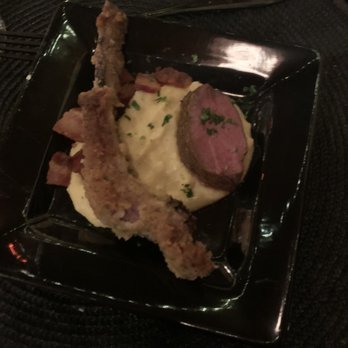 Candle in the Woods - Lamb medallion with gnawing bone - Wine Bars Near Me - Athol, Idaho