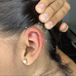 Metal & Stone - Industrial piercing by Steve