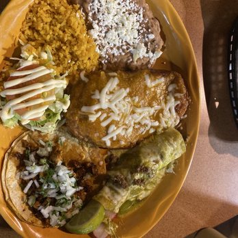 Taqueria El Alteño - Combination plate with a beef enchilada with green sauce, chili relleno, El Pastor taco, refried beans, and rice - Mexican Near Me - Omaha, Nebraska Taqueria El Alteño - Combination plate with a beef enchilada with green sauce, chili relleno, El Pastor taco, refried beans, and rice - Mexican Near Me - Omaha, Nebraska