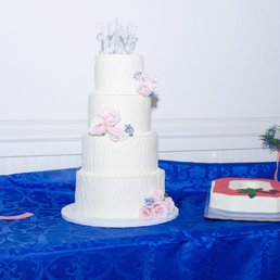 Our wedding cake and groom cake Our wedding cake and groom cake
