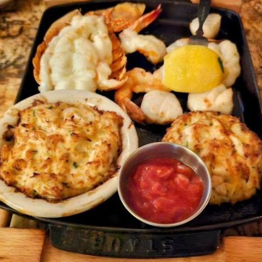 Dutch's Daughter - Crab cake, lobster, scallops, crab imperial and shrimp. - Seafood Near Me - Frederick, Maryland Dutch's Daughter - Crab cake, lobster, scallops, crab imperial and shrimp. - Seafood Near Me - Frederick, Maryland