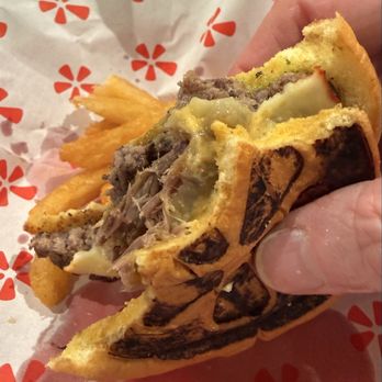 Smash and Sizzle - A shot of inside the burger with some brisket on top, so good - Burgers Near Me - High Point, North Carolina Smash and Sizzle - A shot of inside the burger with some brisket on top, so good - Burgers Near Me - High Point, North Carolina