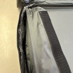 Alamo Shoe Repair - Photo of the horrible zipper repair job.