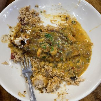 Bongo Beaux's Bourre Palace & Cajun Kitchen - Drowned grilled catfish over jambalaya rice and smothered in ettouffee - Cajun/Creole Near Me - Celina, Texas
