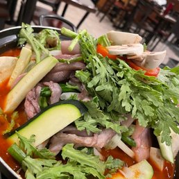 Seafood pot - totally didn't expect the whole octopus was going to be in it too lol. Seafood pot - totally didn't expect the whole octopus was going to be in it too lol.