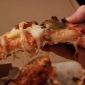 Zahz Pizza - Small (13", eight slice) cheese, pepperoni, hot peppers, and mushroom pizza [Side-view] - Pizza Near Me - Cheektowaga, New York