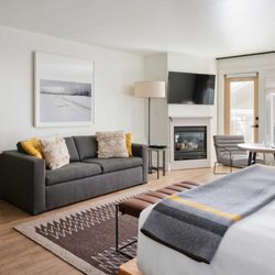 Continuum Hotel - Deluxe King w/ Sofa Sleeper