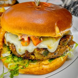 Market Yard Grille - Best turkey burger I've ever had. Roasted corn and poblano peppers mixed into the meat. Chipotle aioli. Flavor bomb!