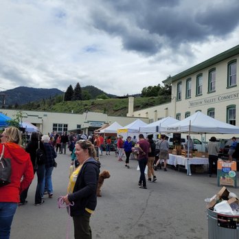 Methow Valley Farmer's Market - a woman and her dog - Farmers Market Near Me - Twisp, Washington Methow Valley Farmer's Market - a woman and her dog - Farmers Market Near Me - Twisp, Washington