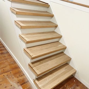 Quality Painting & Remodeling - a wooden staircase - Painters Near Me Quality Painting & Remodeling - a wooden staircase - Painters Near Me