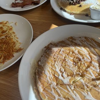 Broken Yolk Cafe - Cinna-Cakes, Short Stack Pancakes (2), Applewood Bacon, Hashbrowns, 2 Eggs, Link Sausage, Iced Chai Latte - American Near Me - Phoenix, Arizona Broken Yolk Cafe - Cinna-Cakes, Short Stack Pancakes (2), Applewood Bacon, Hashbrowns, 2 Eggs, Link Sausage, Iced Chai Latte - American Near Me - Phoenix, Arizona