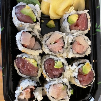 Maguro - a tray of sushi and vegetables - Sushi Bars Near Me - New York, New York Maguro - a tray of sushi and vegetables - Sushi Bars Near Me - New York, New York