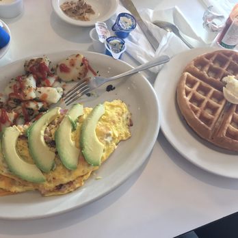 Zig's Restaurant - Ham & cheese omelette with avocado on top served with country potatoes. With a plain waffle on the side. - American Near Me - Reseda, California Zig's Restaurant - Ham & cheese omelette with avocado on top served with country potatoes. With a plain waffle on the side. - American Near Me - Reseda, California