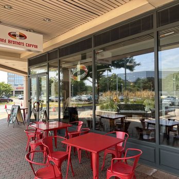Weird Brothers Coffee - red tables and chairs outside - Coffee & Tea Near Me - Herndon, Virginia