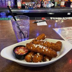 Dixie Tavern - Mozzarella Cheese Sticks are the bomb plus a Bacardi Peach Rum and Sprite is so good.
