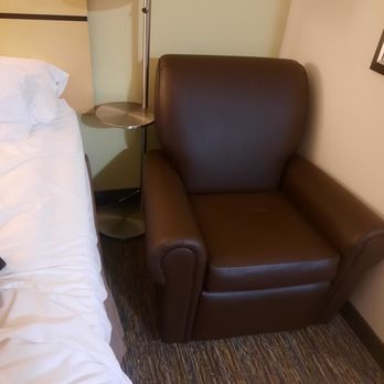 Candlewood Suites Alabaster - Recliner stuffed into narrow space by head off bed. Difficult to get around/in and out of bed on that side. All outlets on opposite side. - Hotels Near Me - Alabaster, Alabama Candlewood Suites Alabaster - Recliner stuffed into narrow space by head off bed. Difficult to get around/in and out of bed on that side. All outlets on opposite side. - Hotels Near Me - Alabaster, Alabama