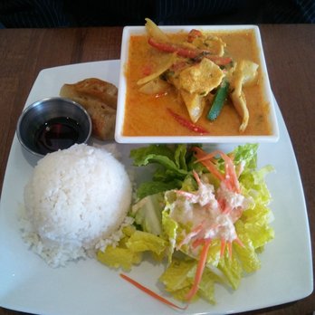 Muay Thai Kitchen - This is the yellow curry with chicken. Spice level is extra spicy. That's why it looks red and not yellow. Lol.. - Thai Near Me - San Marcos, California