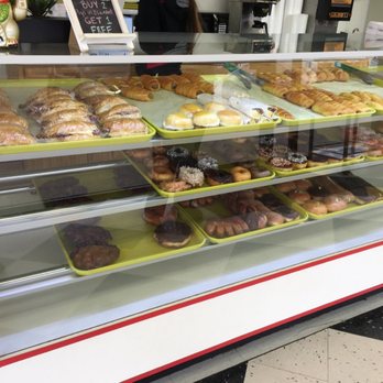 USA Donuts - a display case filled with various types of donuts - Donuts Near Me - Palestine, Texas USA Donuts - a display case filled with various types of donuts - Donuts Near Me - Palestine, Texas